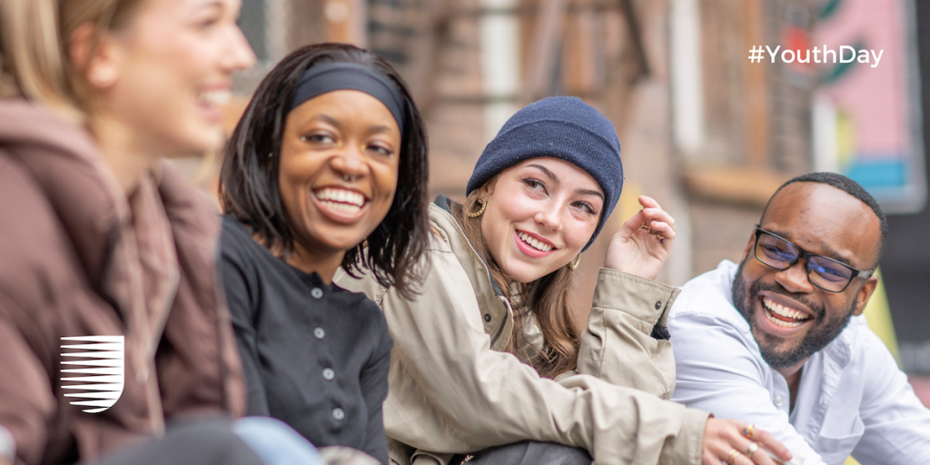 Young people laughing in a group