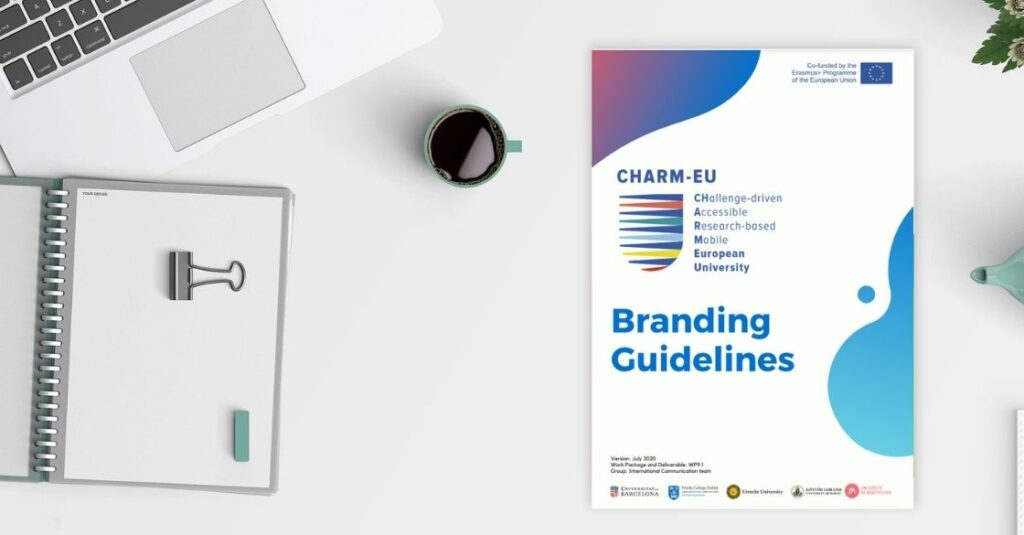 Picture of a laptop, a booknote and coffee on the table with the CHARM-EU Branding Guidelines.