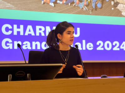 Itziar Salazar, CHARM-EU Alumni from the Master's in Global Challenges for Sustainability, giving her speach during the closing session of the Grand Finale 2024.