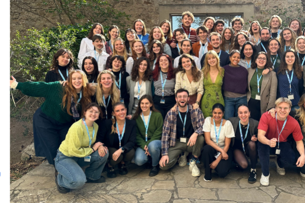 Banner with the group photo of the 2nd cohort from the Masters' in Global Challenges for Sustainability during the Grand Finale 2024 at the Faculty of Audiovisual, University of Barcelona