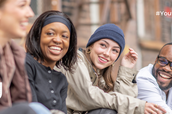 Young people laughing in a group