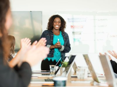 woman-happy-leading-meeting